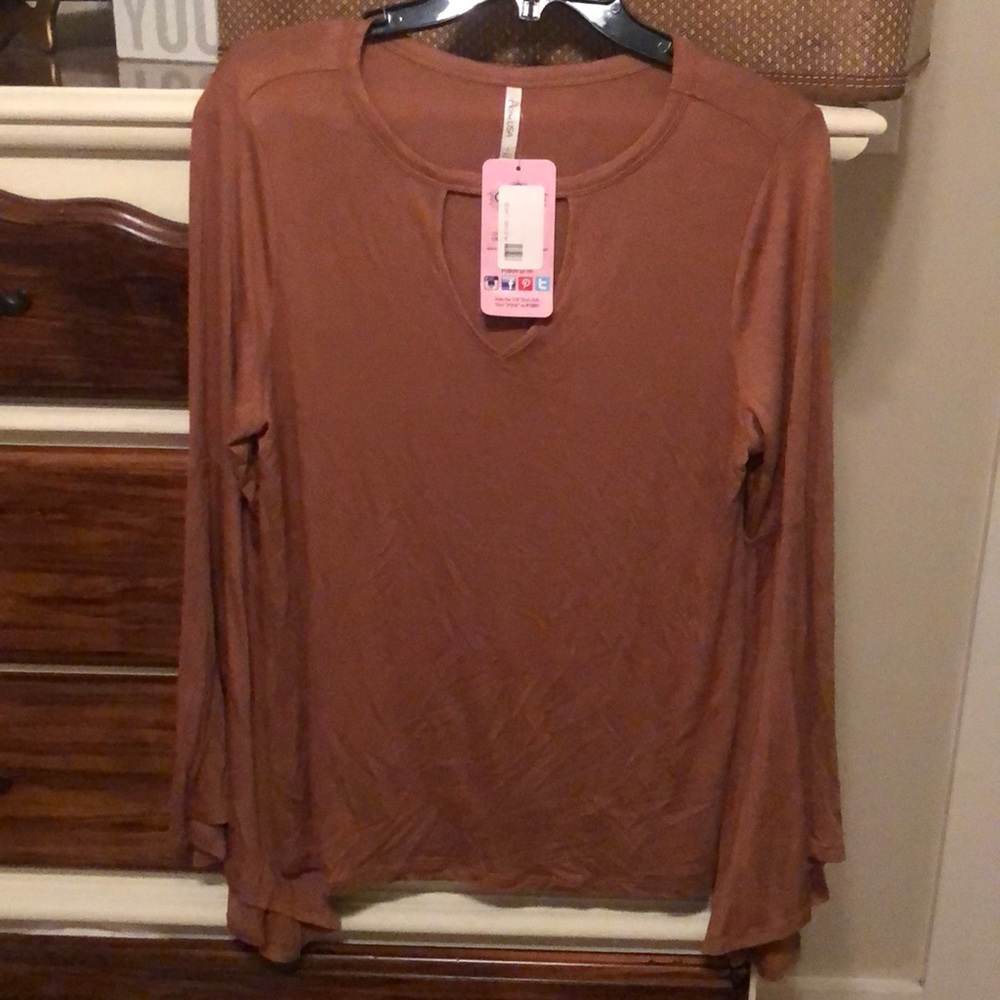 Mustard colored long sleeve top with flowy arms